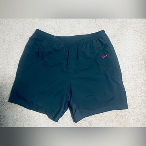 🚴 Nike Athletic Black Cycling Shorts with Pink Swoosh and Padded Lining